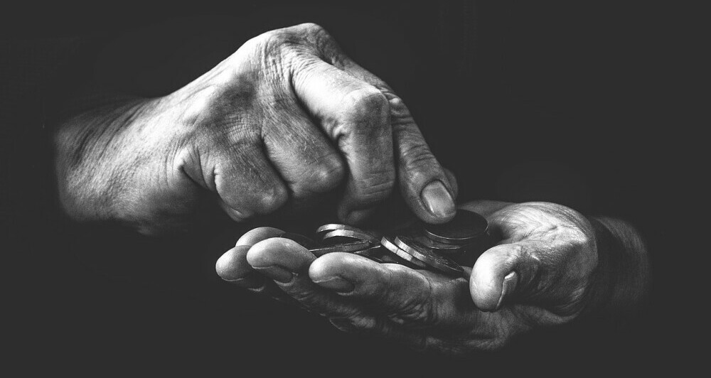 hand counting coins